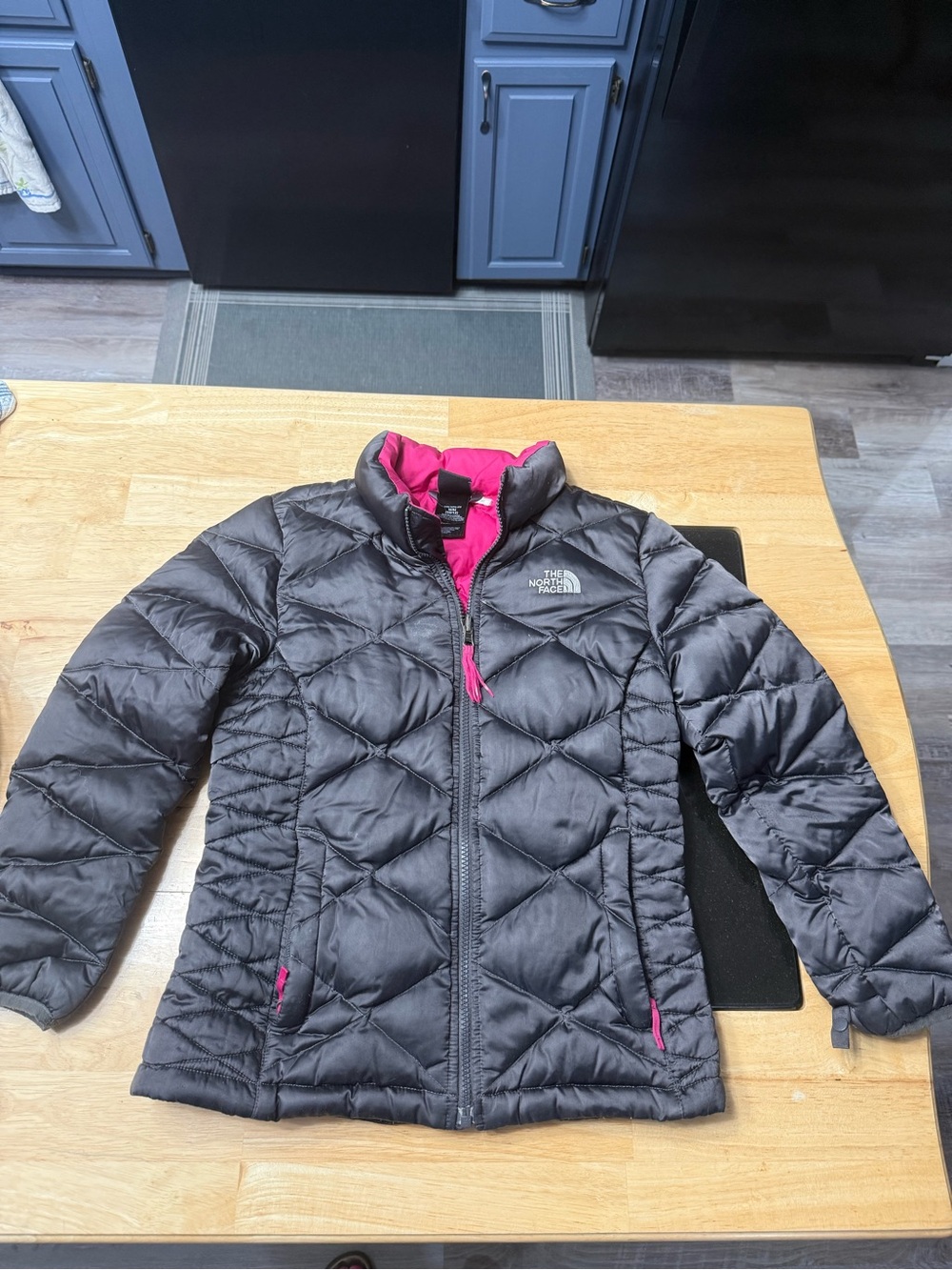 The North Face Kids' Black Puffer Jacket with Hot Pink Lining 10/12 girls